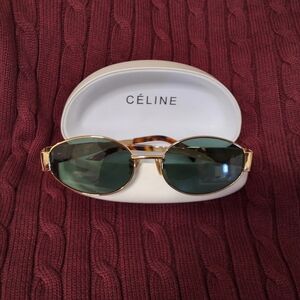 Celine CL40235U Triomphe metal sunglasses in shiny gold.